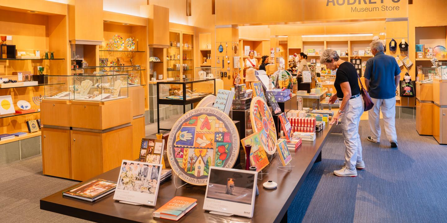 Shoppers look through items at Audrey's Museum Store