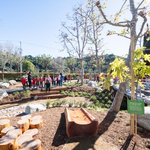 Children walk along the Bloom Garden pathways.